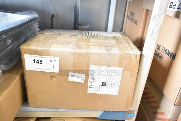 Box labeled "148" containing a brand new, scratch and dent portable tyre regroover. Box has handling labels.