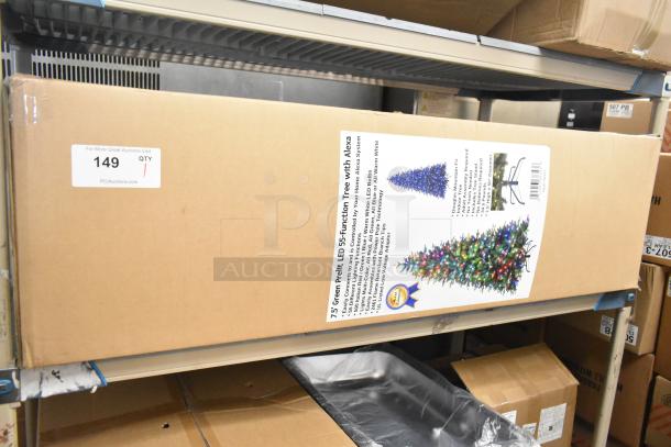 7.5' green prelit fake Christmas tree in original box, features LED lights and Alexa compatibility. Box shows tree image and details.