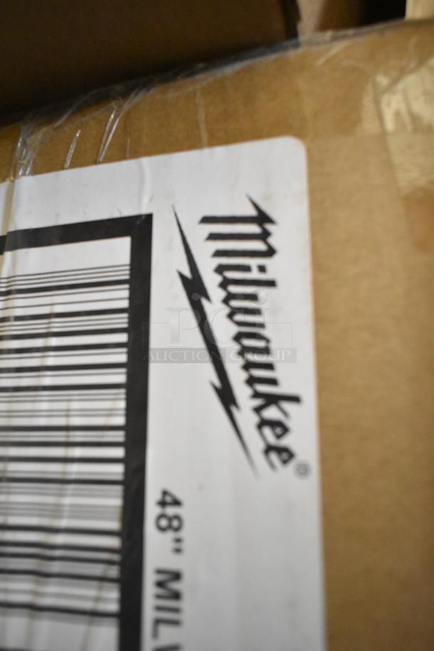 Box of 6 Milwaukee MLCON48 48" Concrete Levels, new, scratch and dent condition, Milwaukee label visible.