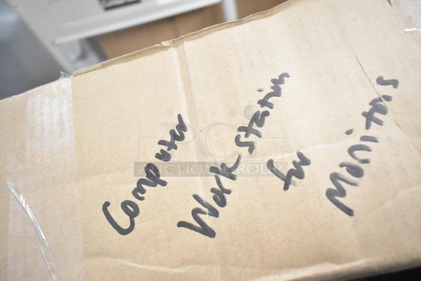 BRAND NEW SCRATCH AND DENT! 33-349-200 Ergotron Computer Work Station box with handwritten label "Computer Workstation for Monitors".