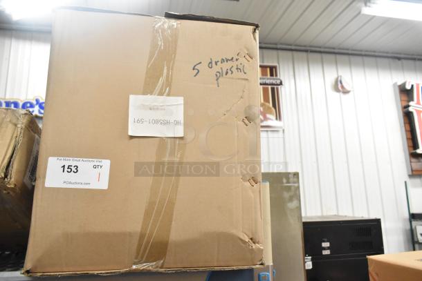 Brown box containing brand new HG-HS5801-591 5 Drawer Plastic Unit with visible scratches and dents, labeled "5 drawer plastic".