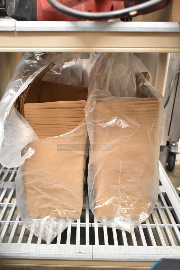 Lot of BRAND NEW Choice kraft paper #3 take-out containers with window. Dimensions: 8.5" x 6" x 2.5". In plastic packaging.