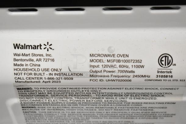 Countertop Microwave Oven, model MSF0B100072352, 120V, 1 phase, 1100W. Includes plate. Manufactured April 2023 for household use.
