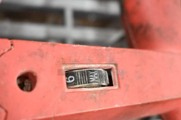 Bauer 1641E-B 1-1/8" 120V SDS rotary hammer with variable speed dial, showing settings from 6 to MAX.