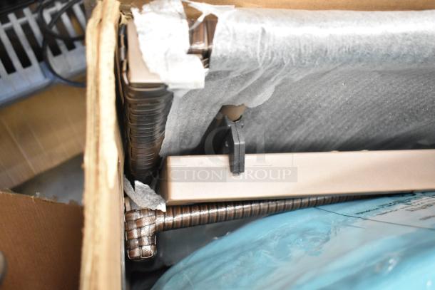 Brand new Costway patio rattan lounge chair, chaise recliner model OP70261TU, visible scratch and dent in packaging.