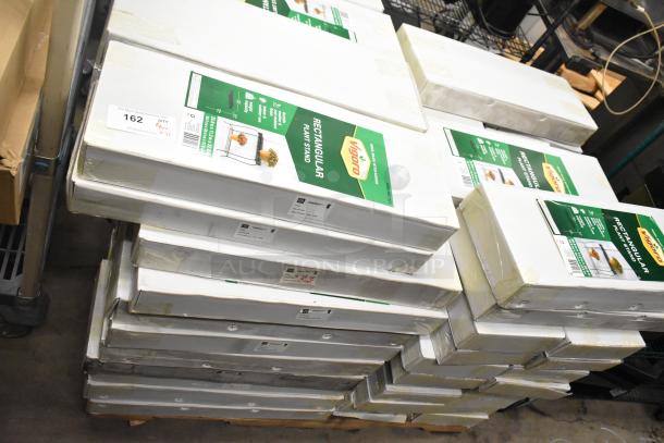 71 brand new scratch and dent Vigoro rectangular plant stands in boxes. Quantity tags indicate auction lot of 71.