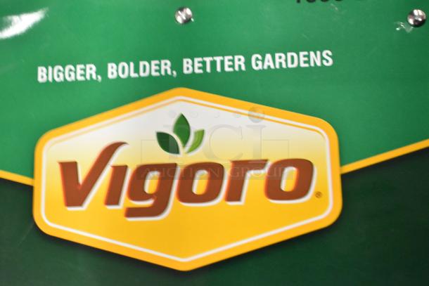 Vigoro plant stand label on green packaging, featuring "Bigger, Bolder, Better Gardens" slogan and logo.