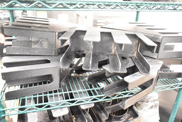 Two-tier lot with stainless steel drop-in bins, lid organizers on a metal shelf. Items show signs of wear.