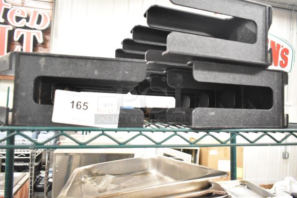 Two-tier lot with stainless steel drop-in bins, metal pans, and lid organizers. Includes a label marked "165, QTY Tier Lot x2."