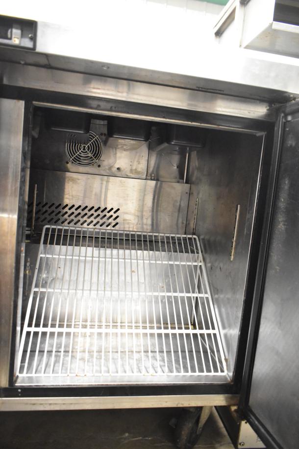 Atosa MSF8302 stainless steel sandwich prep table, mega top, commercial casters, 115V, 1 phase, clean interior, good condition.