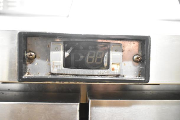 Atosa MSF8302 stainless steel prep table thermostat, showing temperature settings and Dixell branding, in used condition.