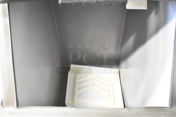 Manitowoc IY0524A-161 stainless steel commercial ice head, interior view of ice bin. 115 volts, 1 phase. Clean condition.