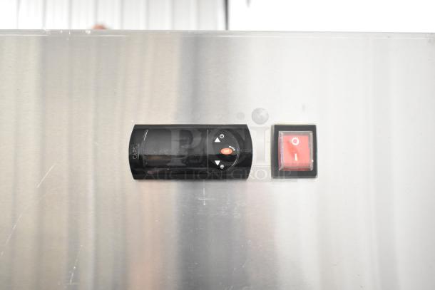 SL55R stainless steel reach-in cooler control panel. Missing door. 115V, 1 phase. Features poly coated racks, commercial casters.