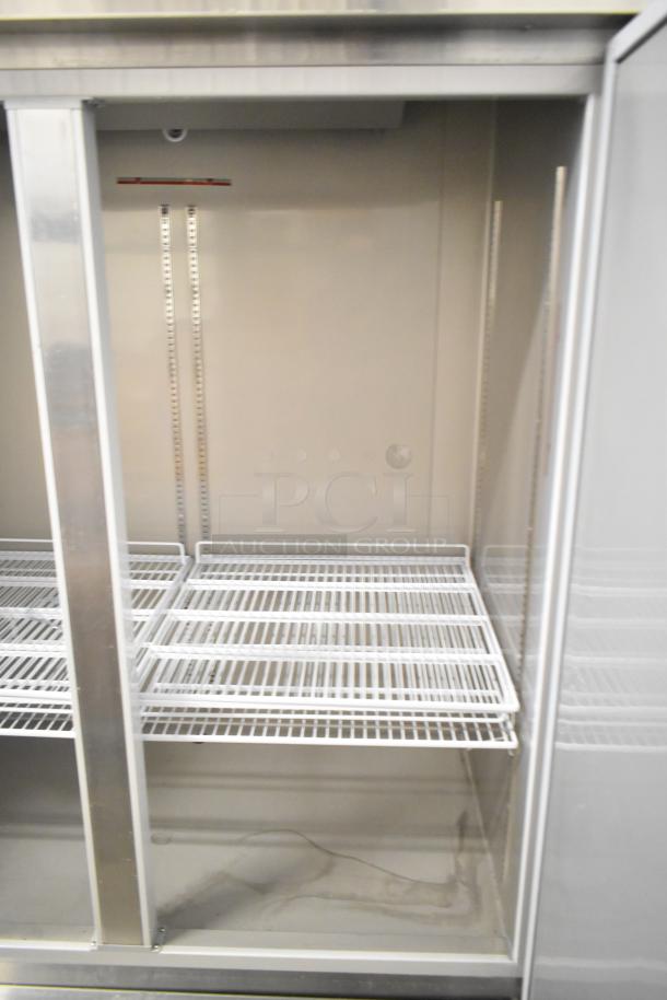 SL55R Stainless Steel Commercial 2 Door Cooler, missing door, with poly-coated racks, on casters, 115V, 1 Phase.