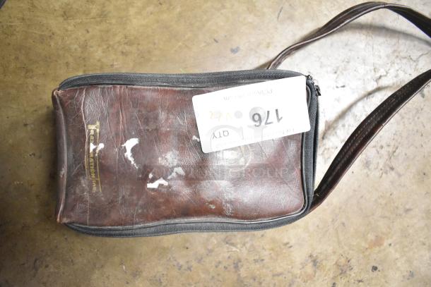 Old brown leather carrying case with visible wear, holding a 1062 MiniTemp Calibrator, labeled "176" and "2x," indicating double bid value.