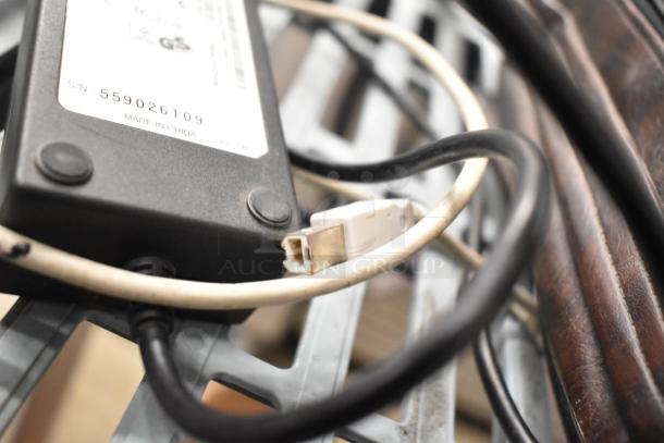 1062 MiniTemp Calibrator with serial number 559026109, in good condition, visible cords, and a "Made in China" label.