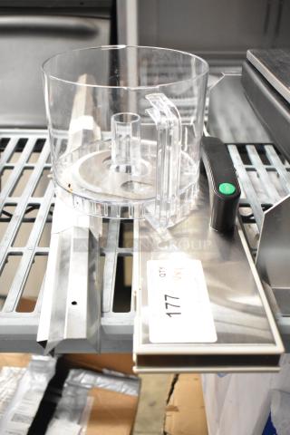 Three items: a clear food processor bowl, and two metal pieces. Includes label reading "177 QTY." Suitable for bids.