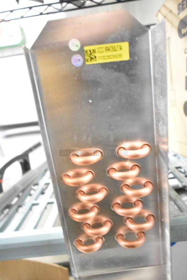 BRAND NEW SCRATCH AND DENT! XCCC 6R4K350L/7.94 Evaporator Coil. Visible yellow label with barcodes. Copper coils intact.