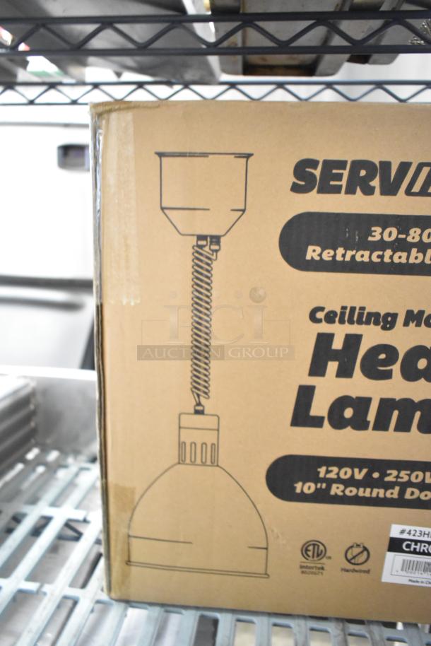 BRAND NEW ServIt 423HLR85CH heat lamp, retractable cord, chrome round dome shade, 120V, 1 Phase. Box shows etching and label.