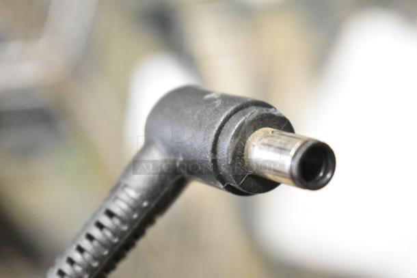 Close-up of an HP desktop power connector. No desktop or additional item details visible.