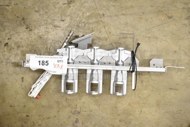 Set of three metal burners, silver finish, includes wiring and mounting hardware. Auction tag "185, QTY 3."