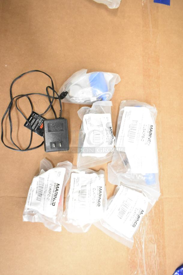 Lot of various items including CLS40FB-D pin connector, CL40FC-A/-B/-E/-D protective caps. Each in sealed packaging.