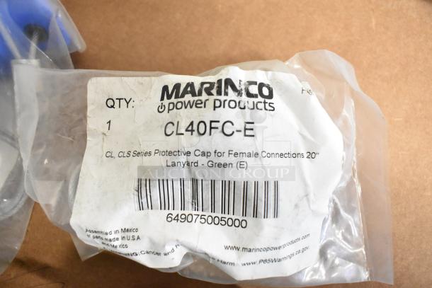 Lot of various items including Marinco CL40FC-E protective cap in original packaging with label and barcode visible.