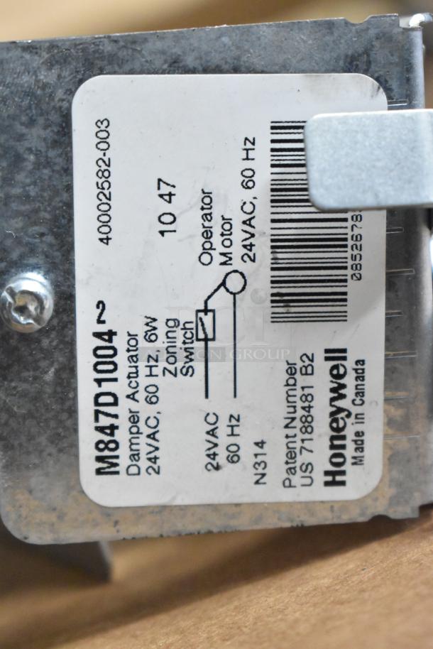 Honeywell M847D1004 Damper Actuator label, 24VAC, 60Hz, 6W, zoning switch diagram, product details visible.