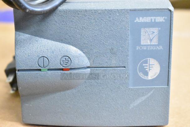 Ametek Powervar power conditioner with labeled Ground Guard feature. Gray finish, excellent condition, included in auction lot.