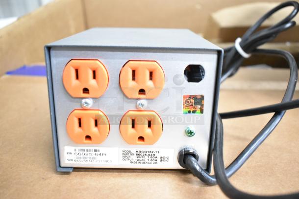 Powervar power conditioner model ABCG152-11, 120V, 1.5A, with four orange outlets and visible labels, in good condition.