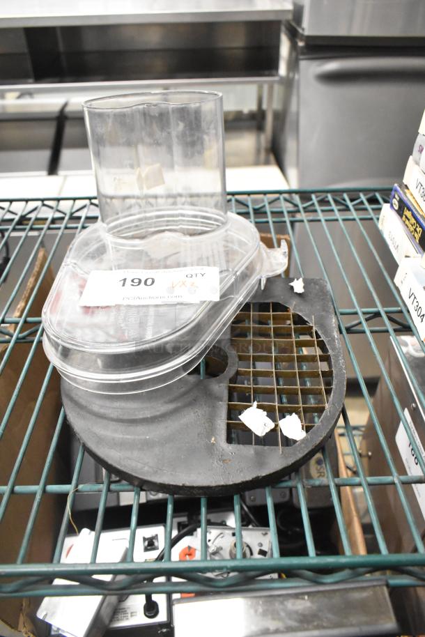 Food processor grate blade and bowl lid on metal shelf, label indicating auction lot 190, includes two items.