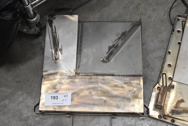 Two metal units with shiny surfaces, showing some wear. Auction tag indicates quantity of 2, item number 193.