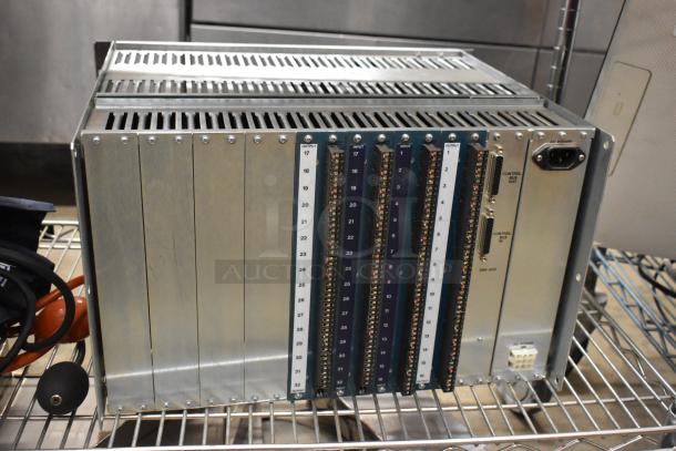 Sigma Electronics ADF-64A Unit, rack-mounted, showing control inputs/outputs, in good condition, visible AC power port.