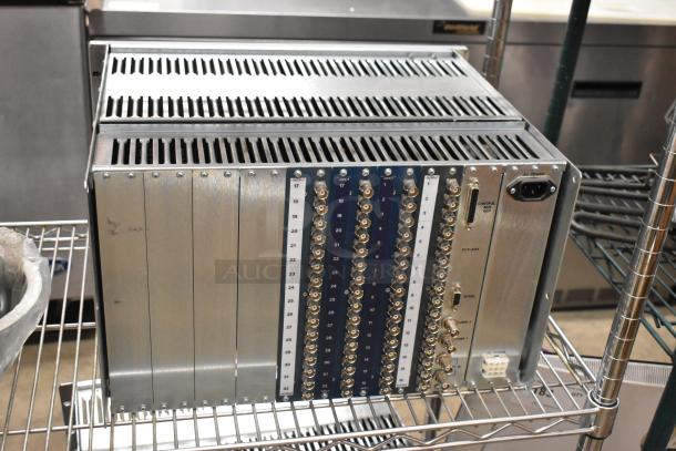 Analog & Digital Switchers A&D Unit with multiple input/output ports, metal casing, visible labels, in good condition.