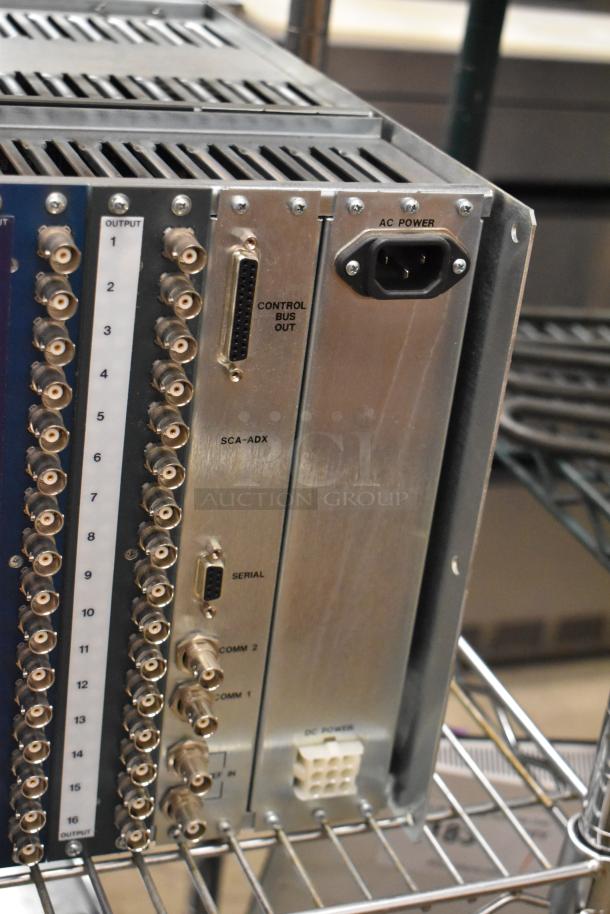 Analog & Digital Switchers A&D Unit with BNC outputs, control bus, serial ports, AC power input, and other connectors.