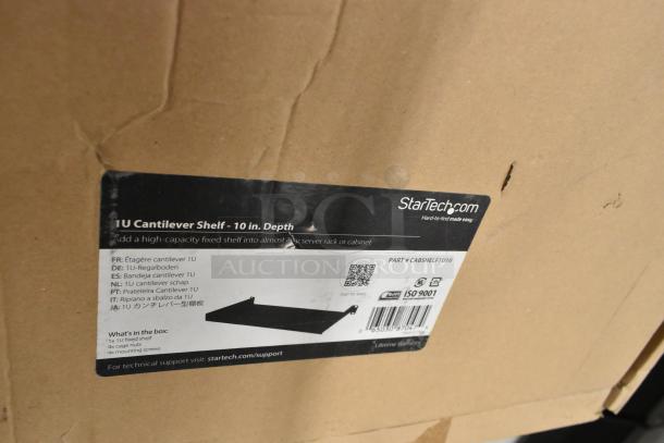 Brand new StarTech 1U Cantilever Shelf, 10-inch depth, in box. Label shows part #CABSHELF1U10, packaging slightly worn.