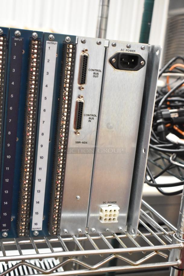 Analog & Digital Switchers A&D Unit featuring input/output ports, control bus, labeled connections for AC/DC power.