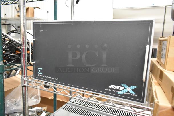 Analog & Digital Switchers A&D Unit by Sigma Electronics, Inc. Black panel, good condition.
