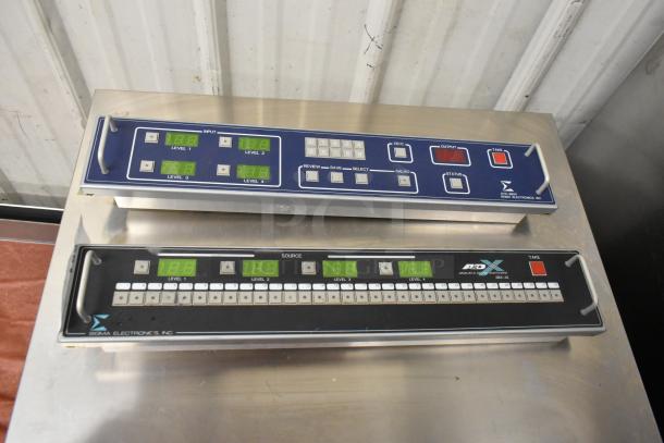 Two Sigma Electronics units: SYC-9600 and SBX-32 Switchers. Features input/output controls, digital displays. Excellent condition.