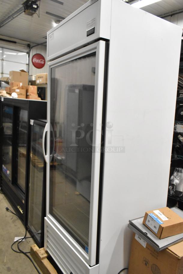 2021 True TSCI-600R-G-PH single door reach-in cooler merchandiser, metal, transparent door, poly-coated racks, 115V, 1 phase.