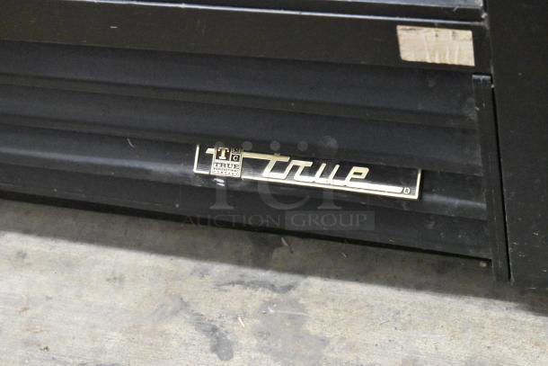 True GDM-41SL-60-LD cooler with metal finish, shown with branding. Includes two doors, poly coated racks. 115V, 1 phase.
