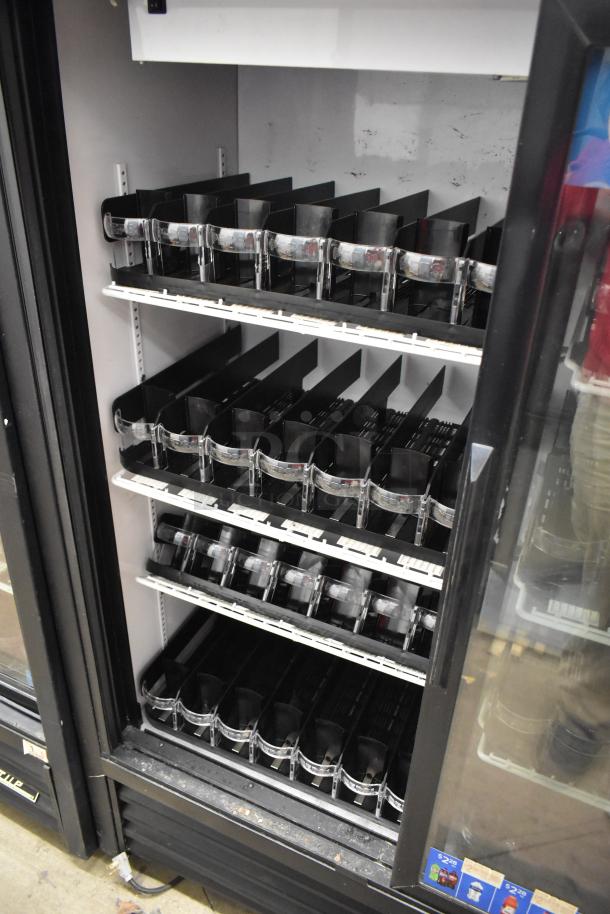 True GDM-41SL-60-LD 2 door cooler, poly coated racks, black exterior, commercial use, 115V, 1 Phase, clean interior.