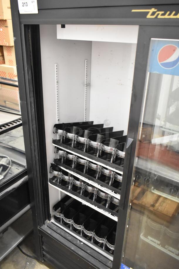 True GDM-41SL-60-LD 2 Door Cooler Merchandiser, metal, poly coated racks, good condition, 115V, 1 Phase.