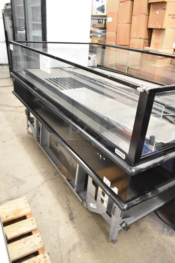 Structural Concepts metal commercial island horizontal grab-n-go merchandiser, glass top, good condition, visible labels.