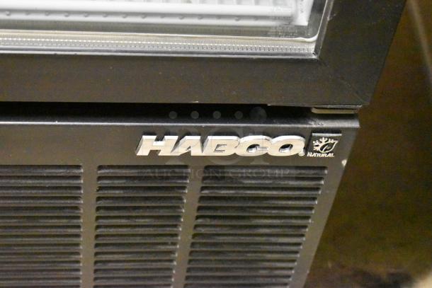 2019 Habco SE18HC commercial cooler, black metal finish, single door, poly-coated racks, 115 volts, 1 phase.