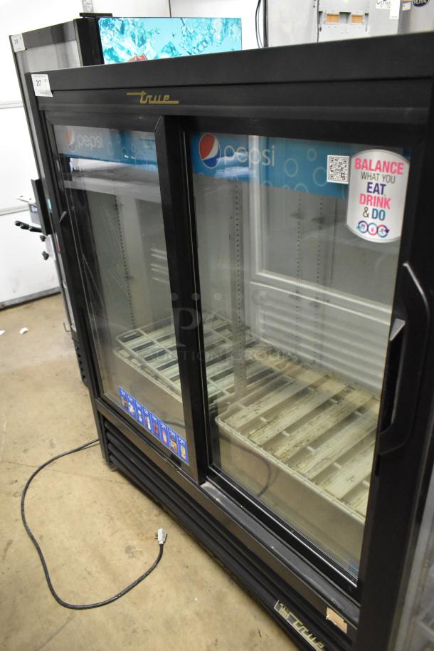 True GDM-41SL-54-LD commercial cooler, two glass doors, poly-coated racks, 115V, 1 phase, Pepsi branding, used condition.
