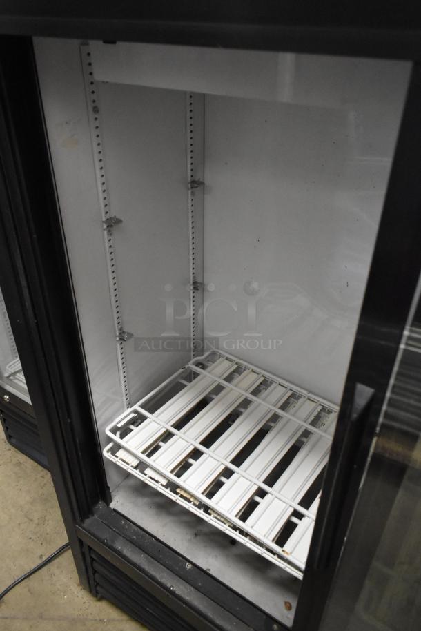 True GDM-41SL-54-LD cooler merchandiser, metal, 2-door, poly-coated racks, 115V, 1 Phase, commercial use, clean interior.