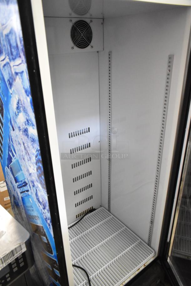 Metal commercial single door reach-in cooler merchandiser with poly-coated racks. Features 115 volts, 1 phase.