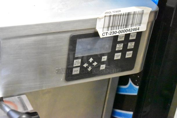 Stoelting stainless steel commercial soft serve machine with control panel. Features two flavors plus twist. Model CT-230-000042464.