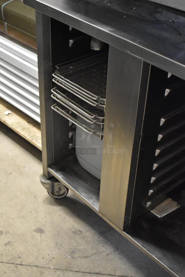 2019 Rational SCC WE 62 commercial combi convection oven on double pan rack stand. Stainless steel, 480V, 3 phase.